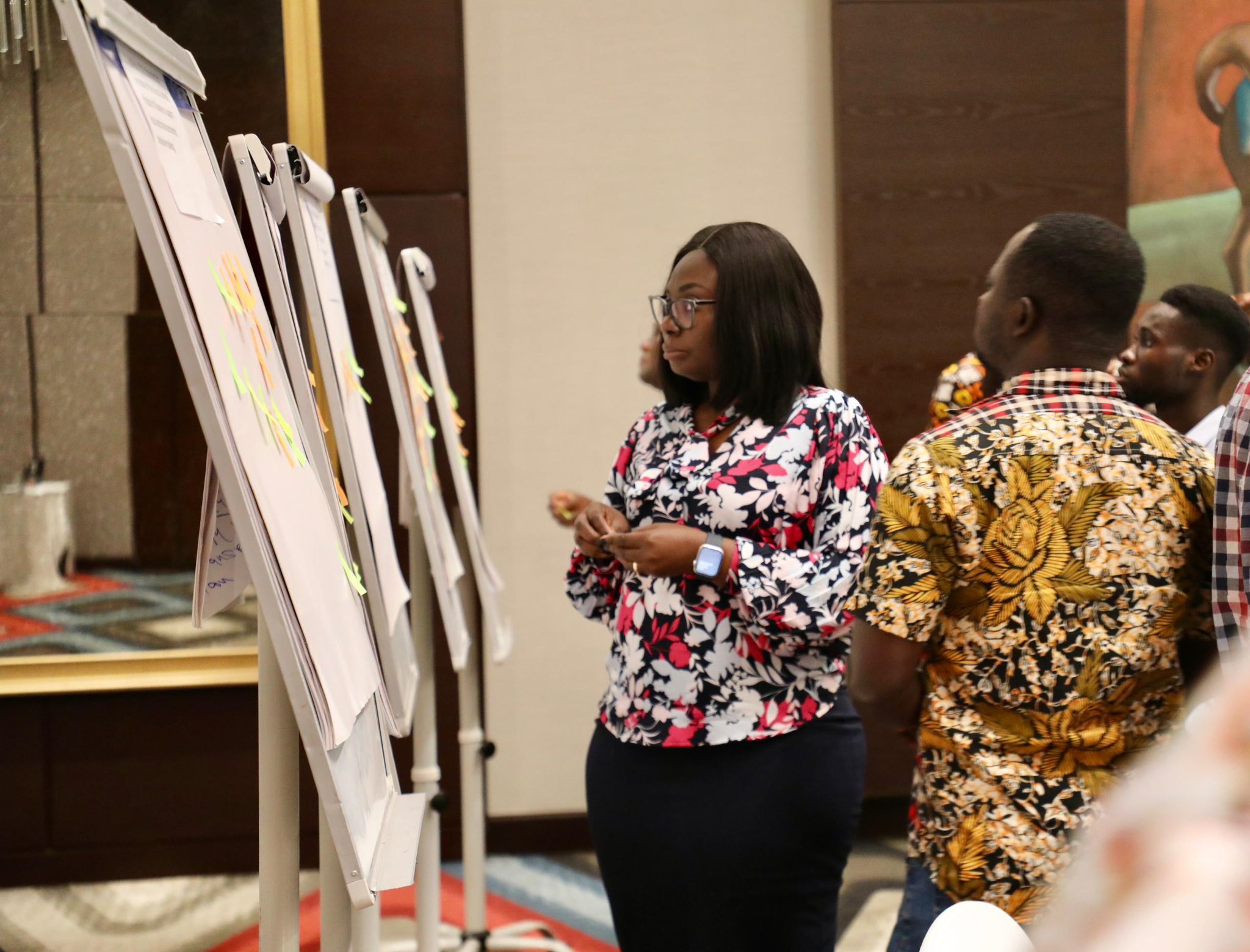 Delegates collaborating around a table